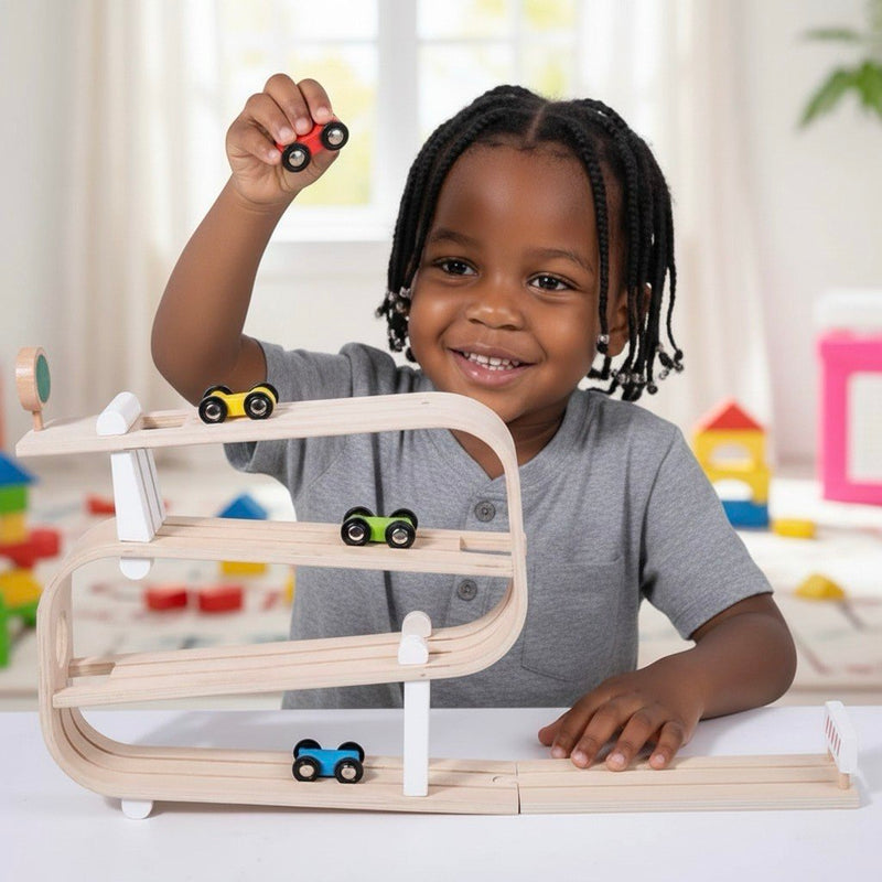 Child playing with a wooden toy track set in a bright room.