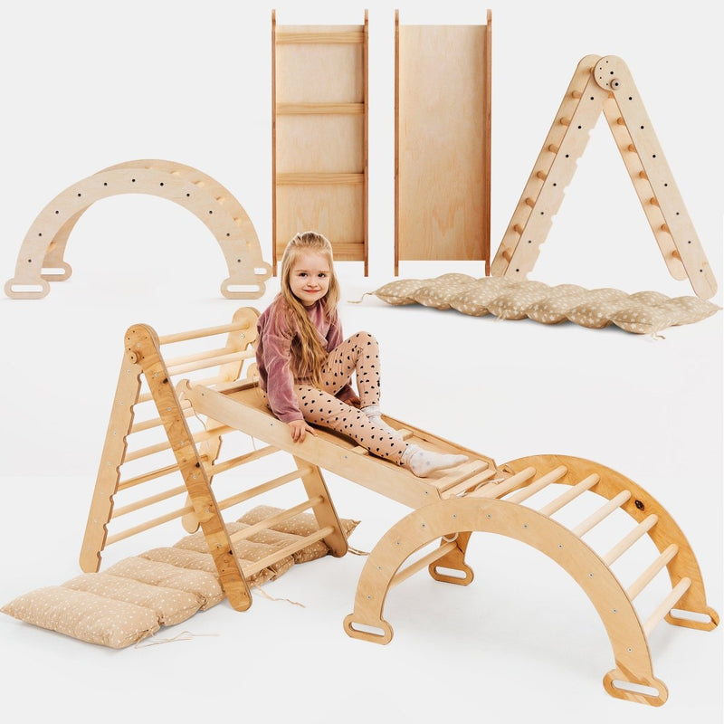 Child playing on a wooden climbing toy set with a white background