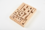 Wooden puzzle with letters and numbers on a white background