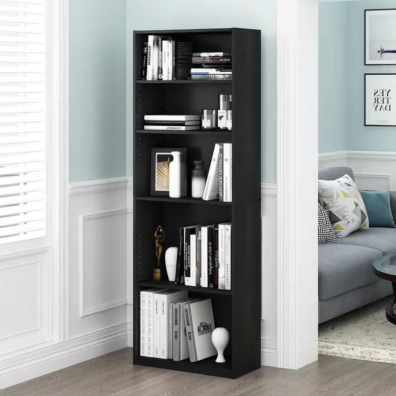 Black bookshelf filled with books and decorative items in a room with a sofa and coffee table.