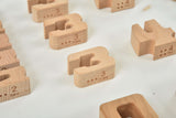 Wooden number blocks on a white surface