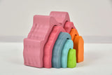 Stack of colorful foam blocks on a white background