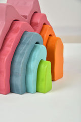 Stack of colorful foam blocks on a white background