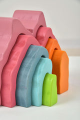 Stack of colorful foam blocks on a white background