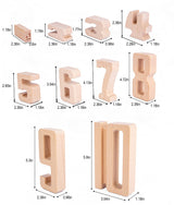 Set of wooden numbers with measurements on a white background