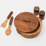 Wooden kitchen set with a large round lid, smaller containers, and utensils on a white background